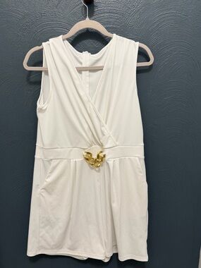 Sleeveless Cream Romper with Gold Chain Accent